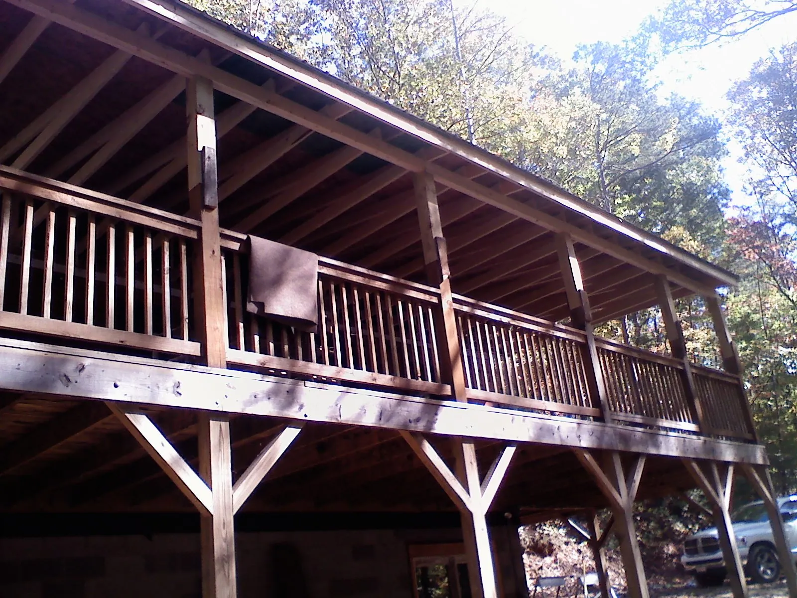 Timber framing under a new elevated porch and deck — Roof Leak Repair in Wales by Roofing Brothers